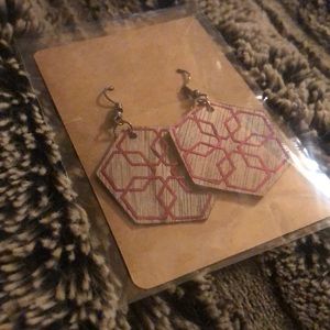Homemade wooden earrings in purple